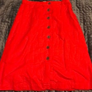 Button down, orange, below-the-knee skirt